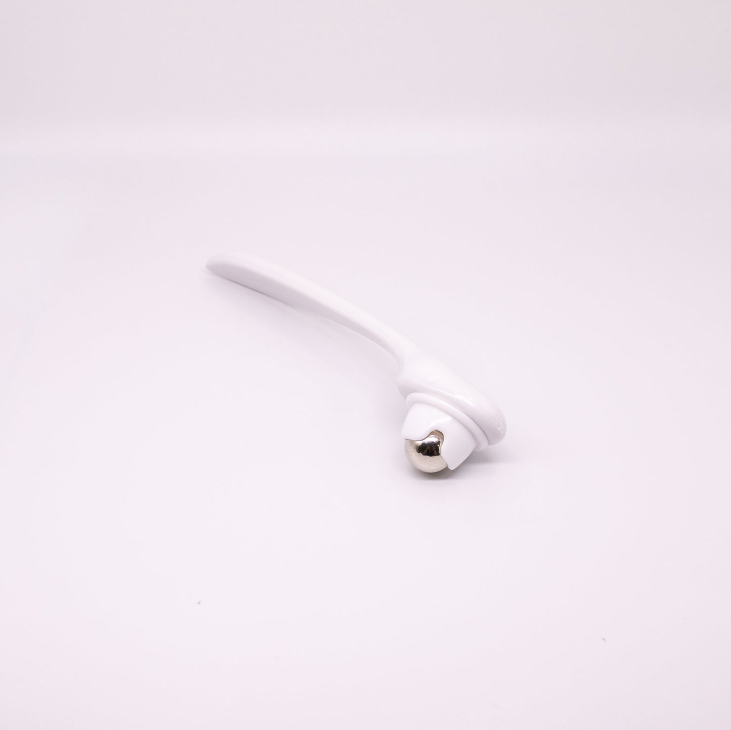 white plastic roller