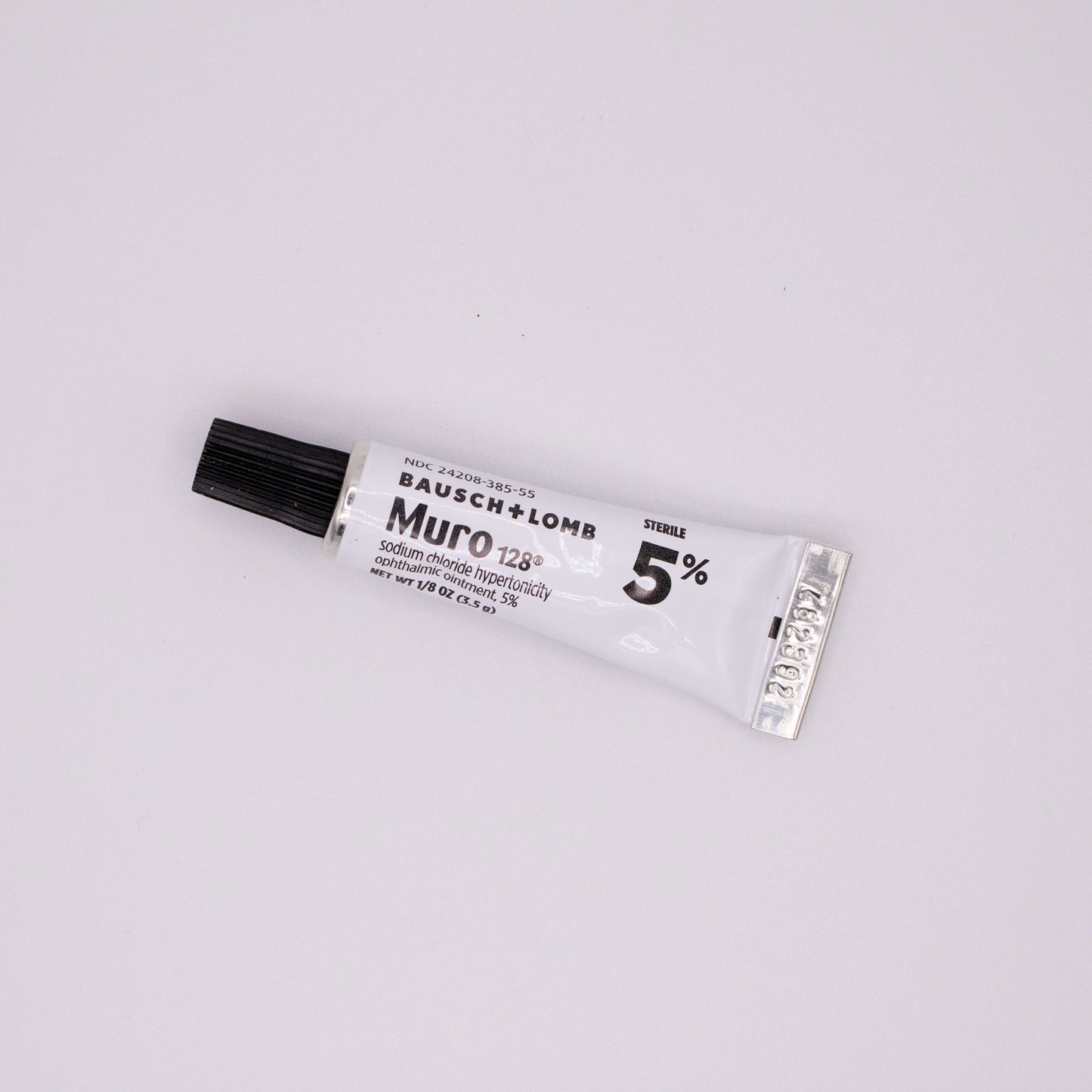 Bausch & Lomb Muro 128 eye drop tube on a white background