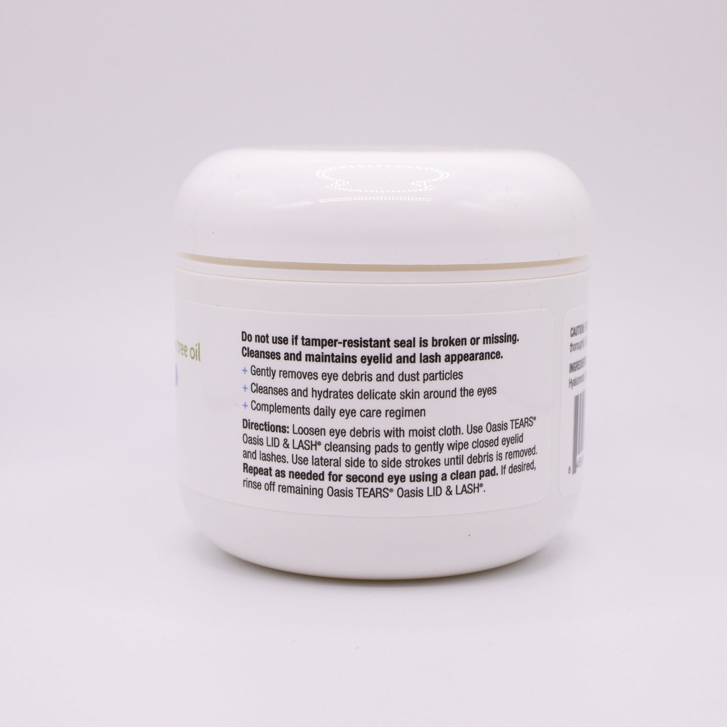Oasis Lid & Lash container directions label on a light gray background
