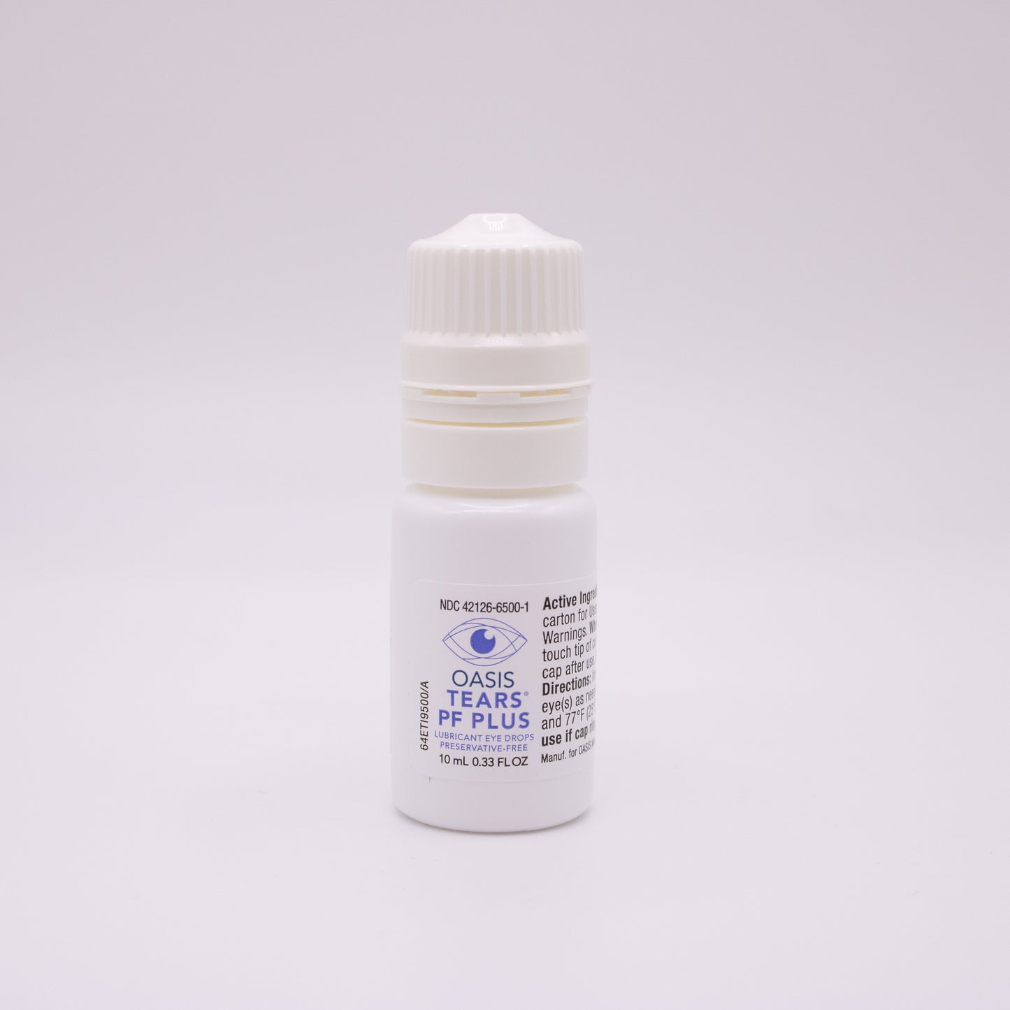 Oasis Tears PF Plus lubricant eye drops bottle with a label on a light gray background