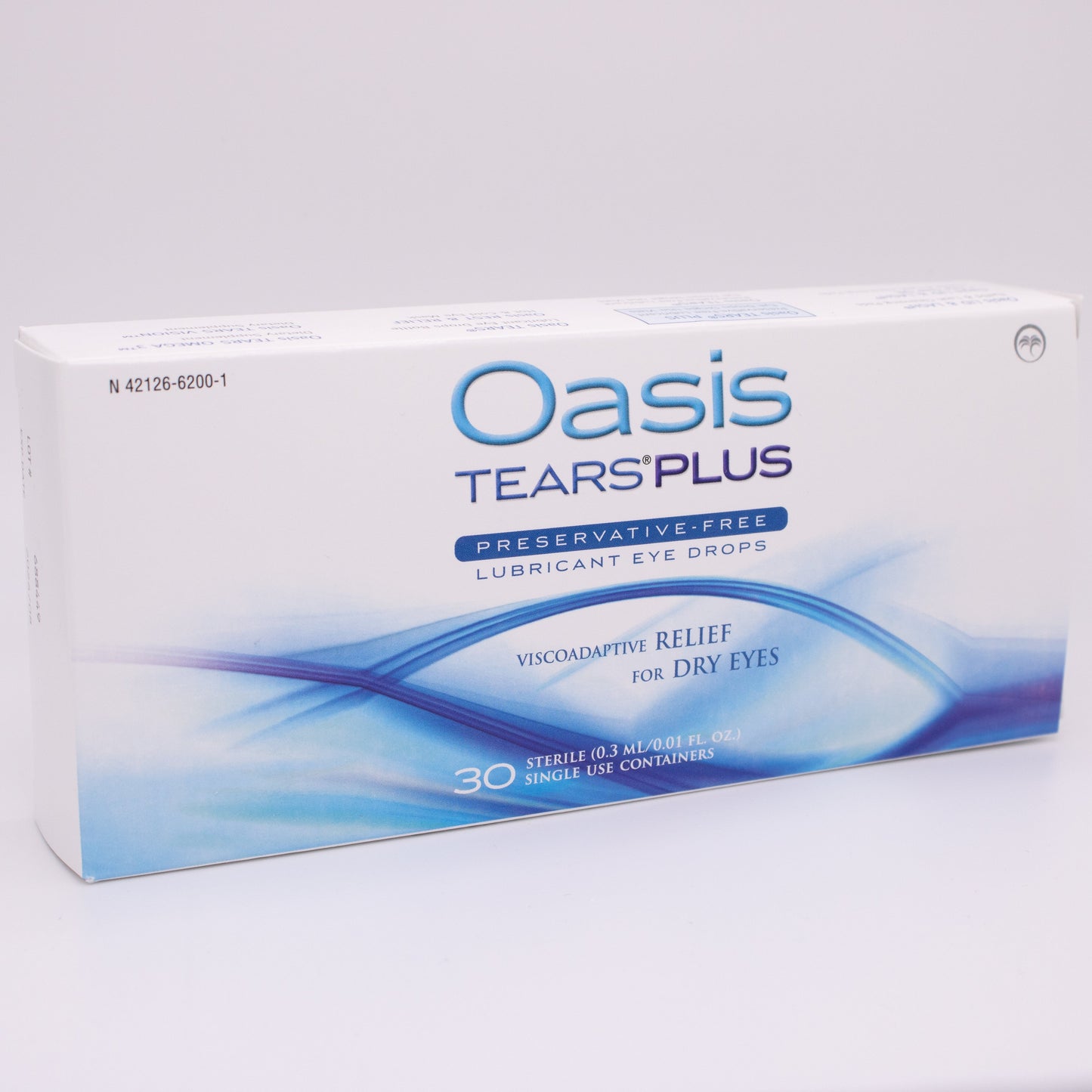 Box of Oasis Tears Plus eye drops on a gray background