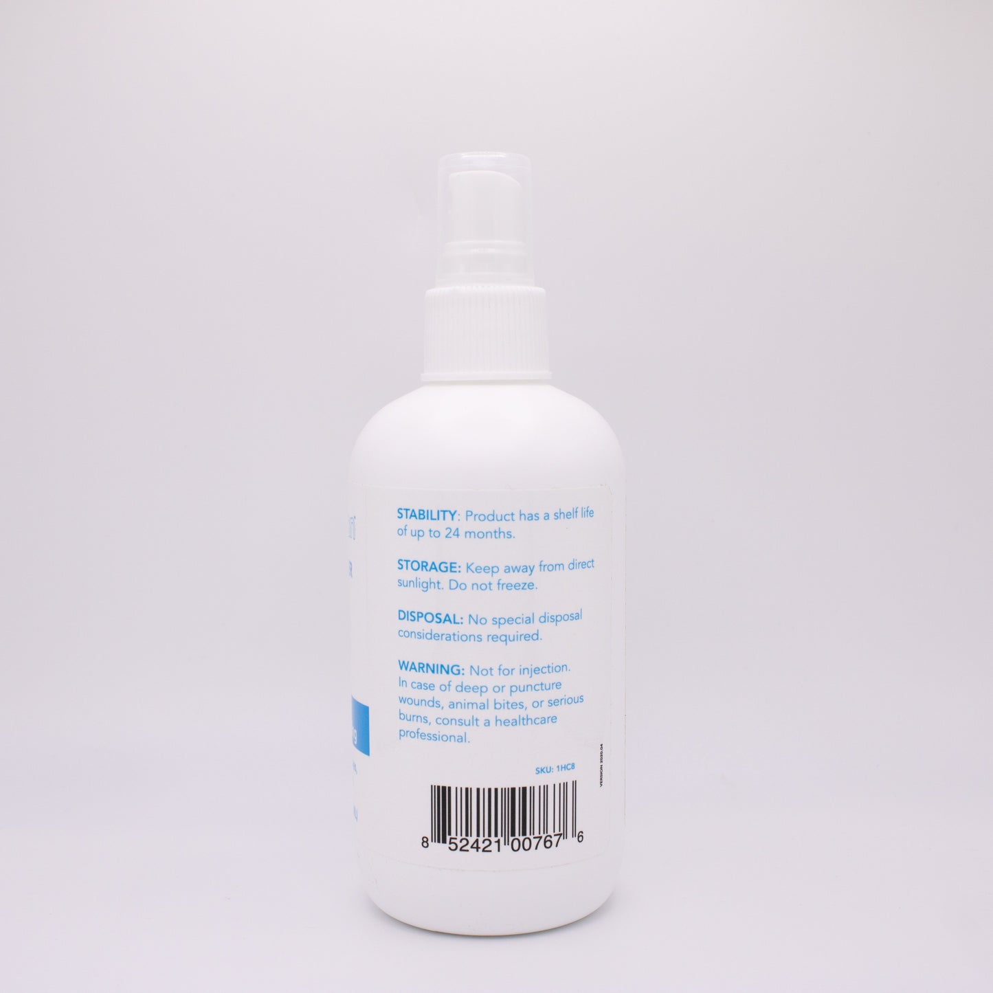 White bottle with blue text on a white background