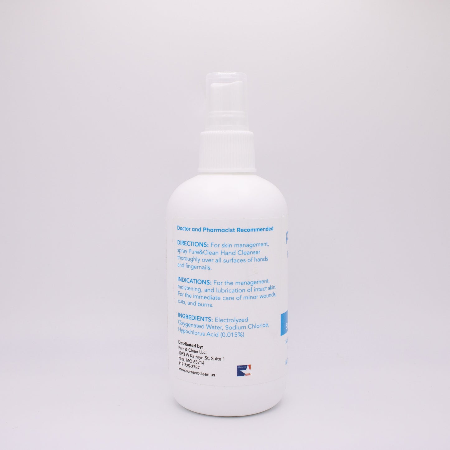 White bottle with blue text on a white background