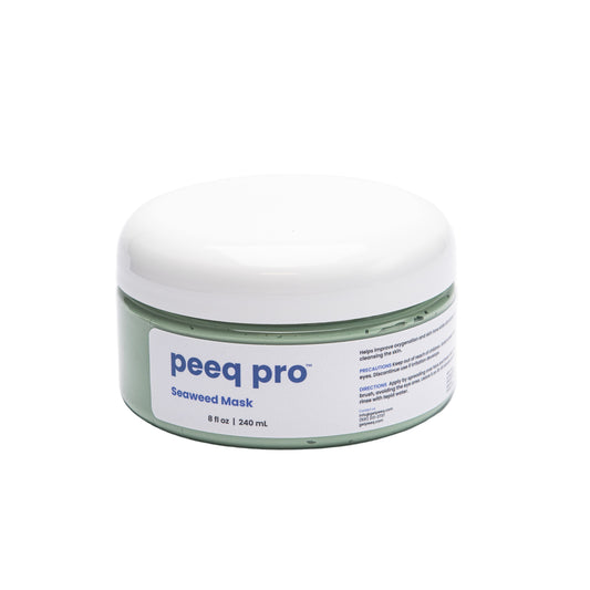 A container of Peeq Pro Seaweed Mask, 8 oz, with a white lid on a white background.