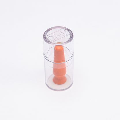 A clear scleral cup with an orange tip used for inserting scleral lenses, hybrid lenses, and soft contact lenses, or for prosthetic eyes.