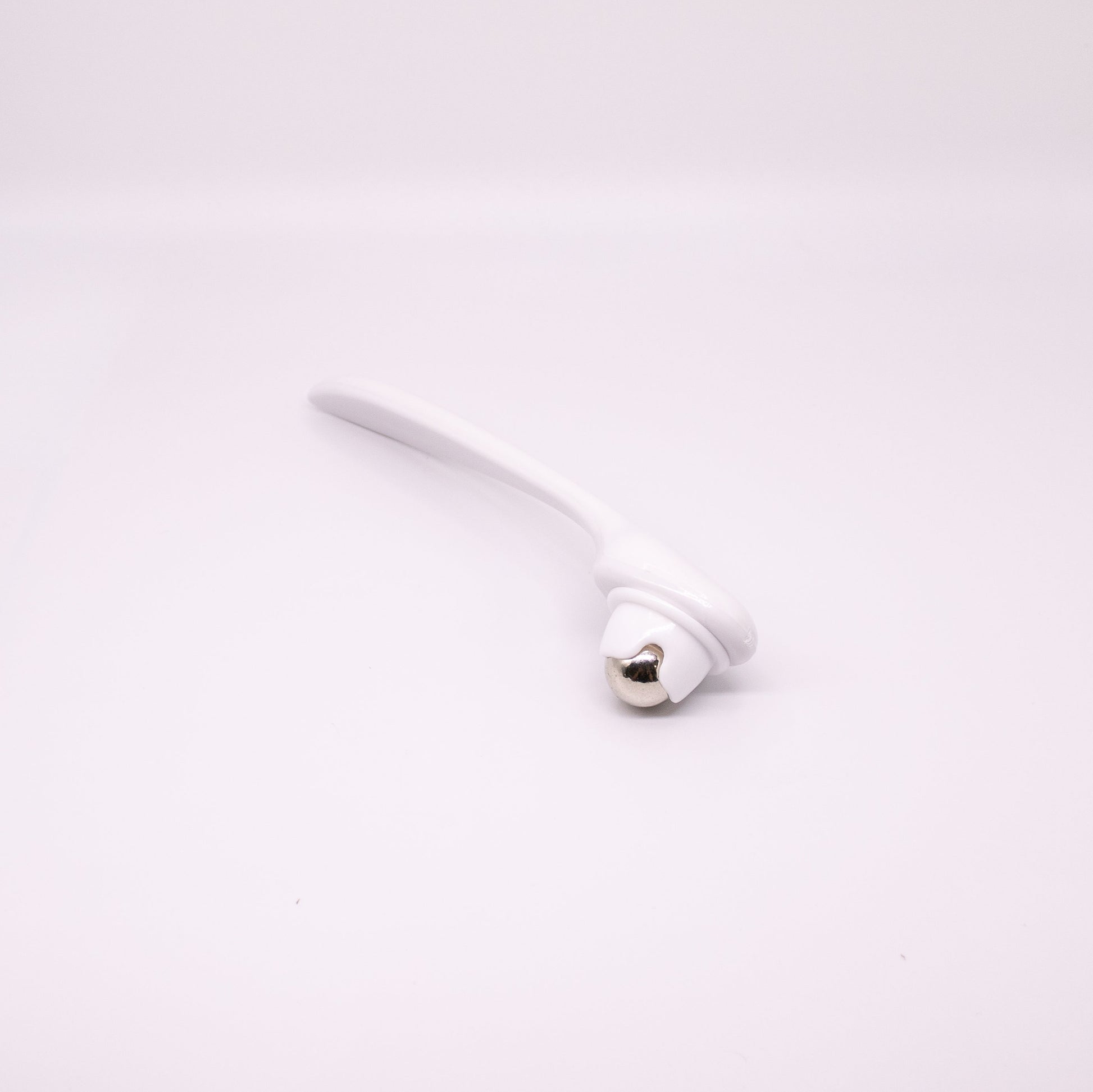 white plastic roller