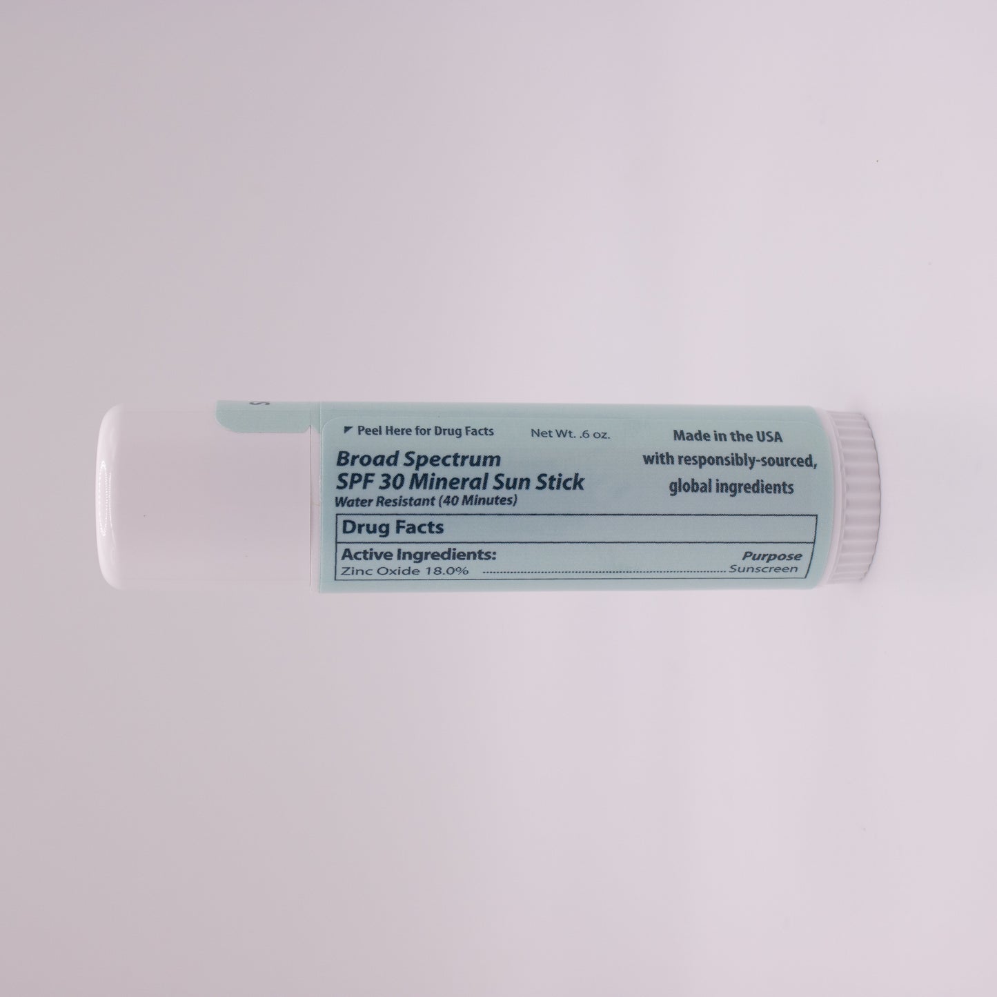 Peeq Sun Cream label on a white background