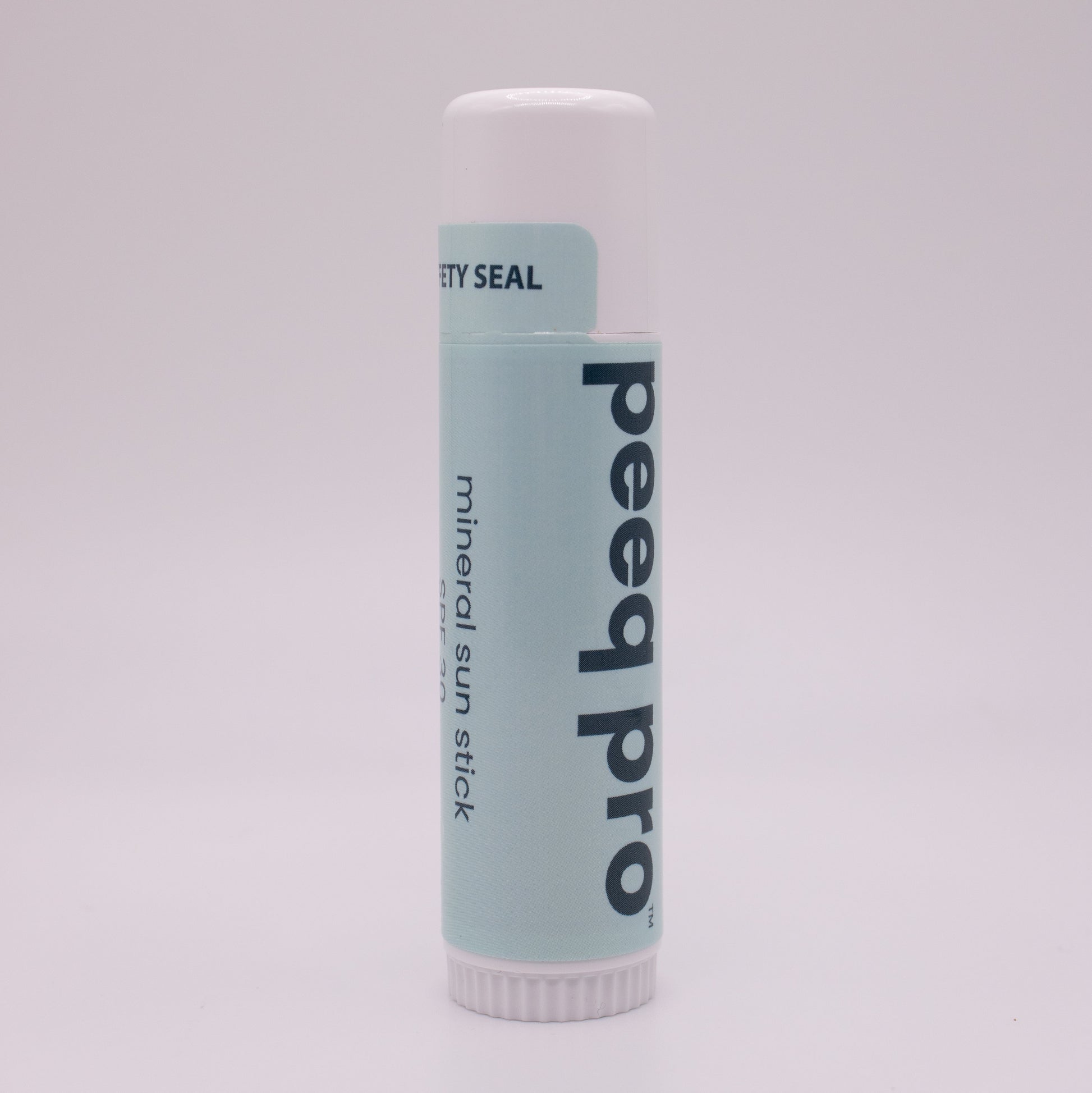 Peeq Pro mineral sun stick on a white background