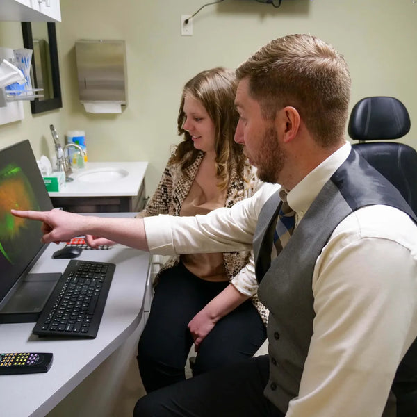 Voss-Vision-Dr-with-Patient.jpg