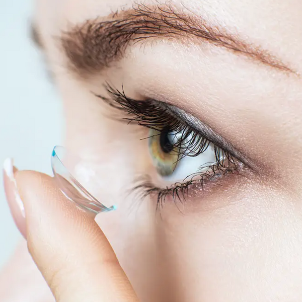 cornea-contact-lens-institute-person-inserting-contact.png