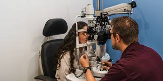 dau-family-eye-care-dr-with-patient.jpg