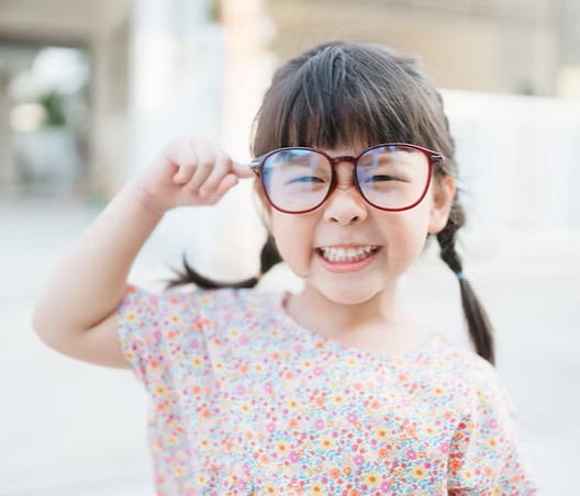 myopia-institute-of-nova-child-wearing-glasses-2.jpg