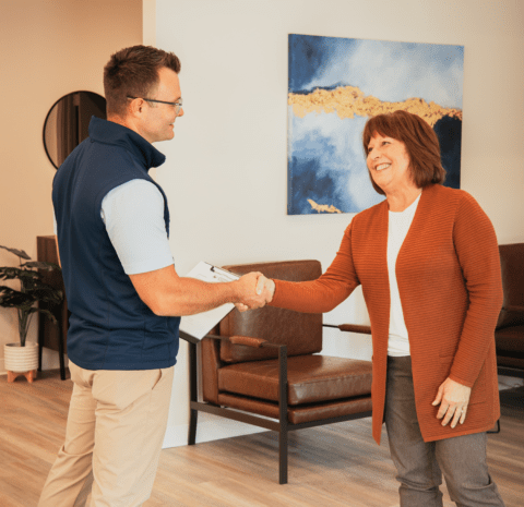 premier-vision-dr-novak-greeting-patient.png